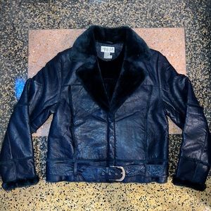 Vintage Genuine blue leather jacket lined with blue faux fur. Size large.